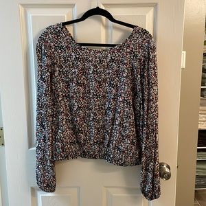 NWOT, never worn Loft blouse. Has V neck in the back and elastic waist.